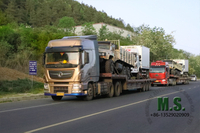 //inrorwxhonpplq5m-static.micyjz.com/cloud/lrBpiKoklrSRjlikpmojjq/Chinese-tractor-truck-carrying-the-truck-to-ship-out.jpg